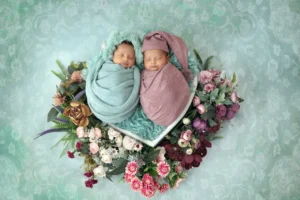 Adorable Twin Babies in Floral Nest