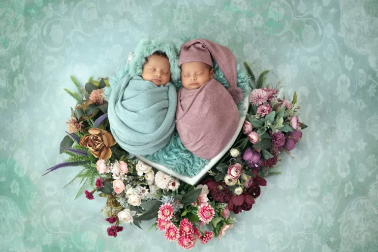 Adorable Twin Babies in Floral Nest
