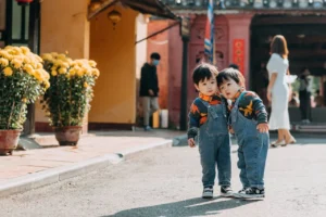 Children Wearing Denim Jumpers