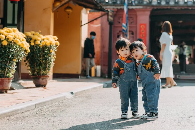 Children Wearing Denim Jumpers